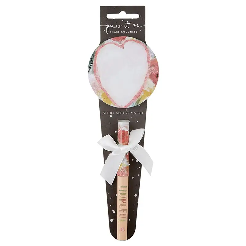 Pen with notepad hopeful heart